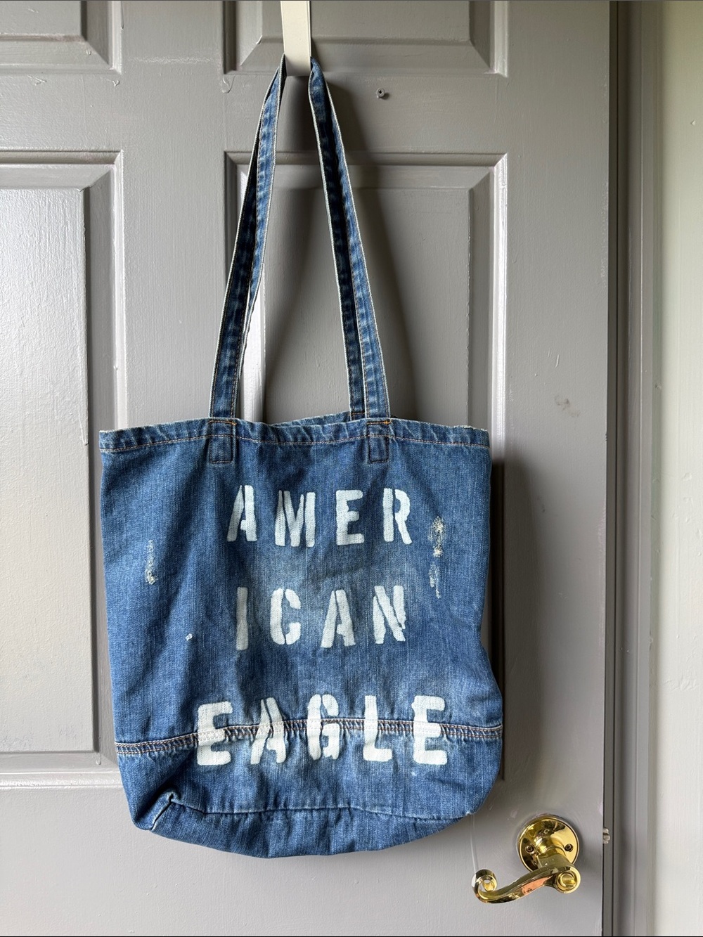 American Eagle Distressed Blue Denim Tote with Tan Patch
